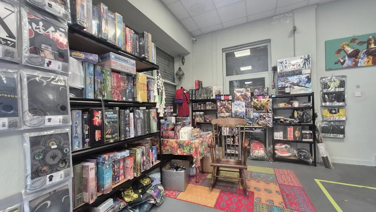 Shelves packed with board games from floor to ceiling